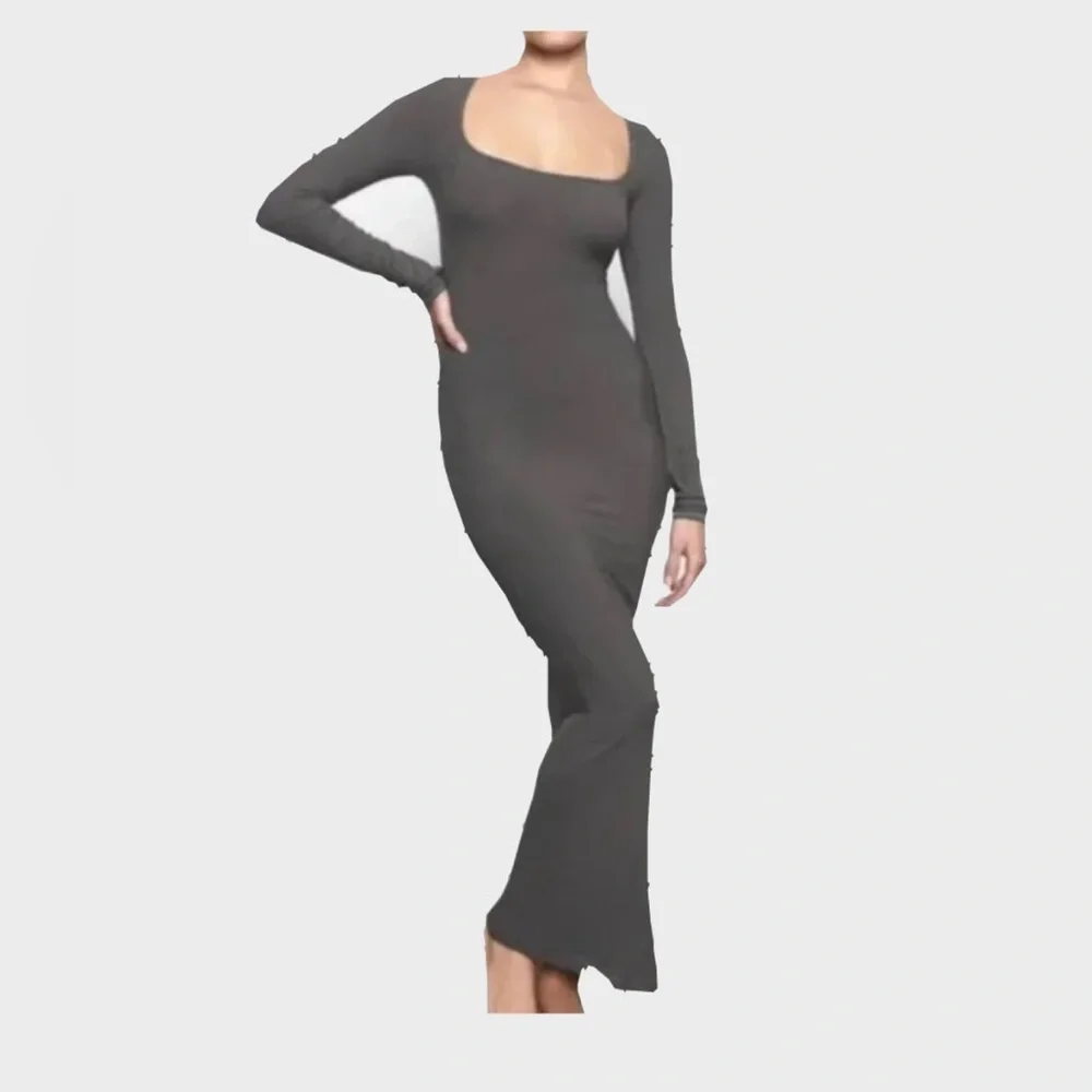 skims bodycon dress Soft Lounge Ribbed Maxi in Black now in a midi length SKIMS Body Midi Dress in